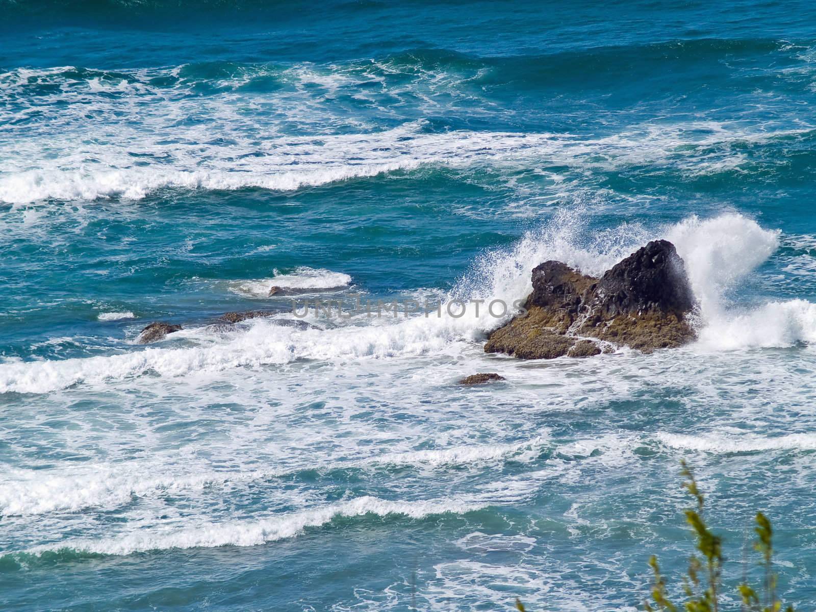 Boulder on the Shore with Waves Crashing by Frankljunior