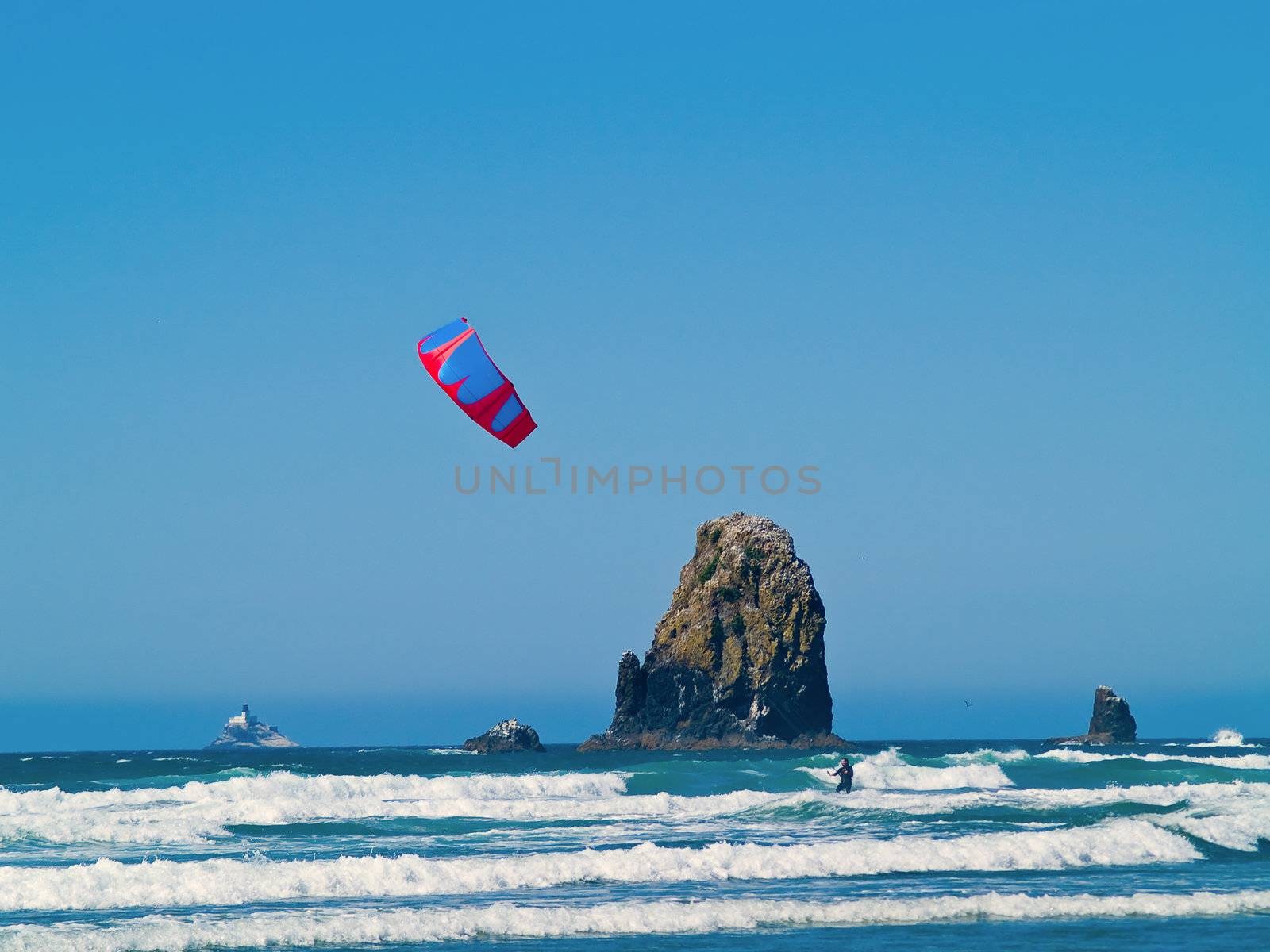 Kite Surfer out on the Ocean on a Sunny Day