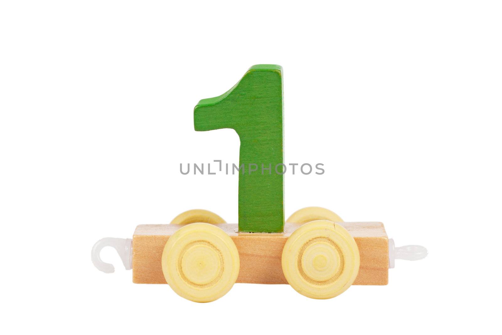 Wooden toy on a wheels number 1 isolated over white