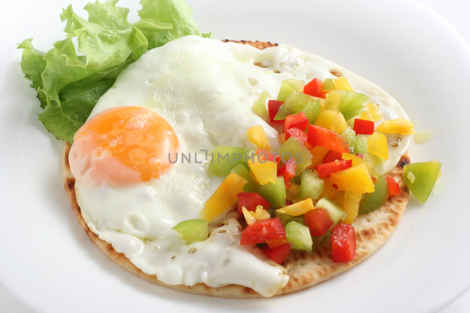 fried egg with salsa by nataliamylova