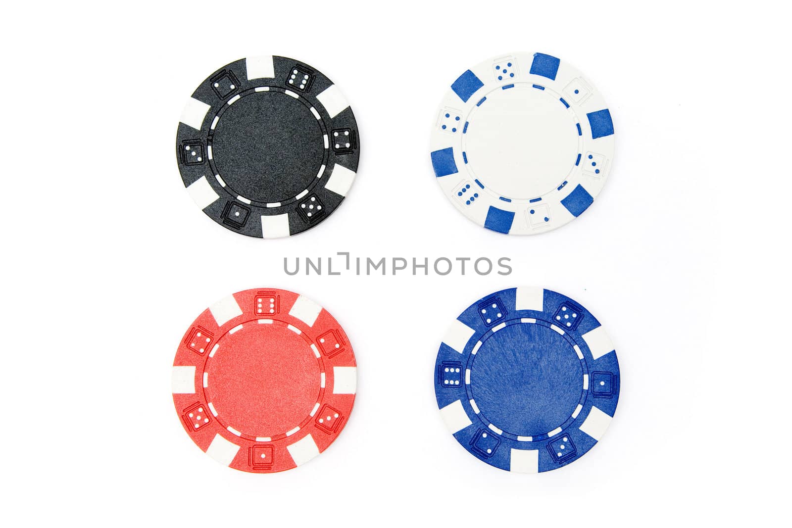 Different poker chips isolated on a white background.
