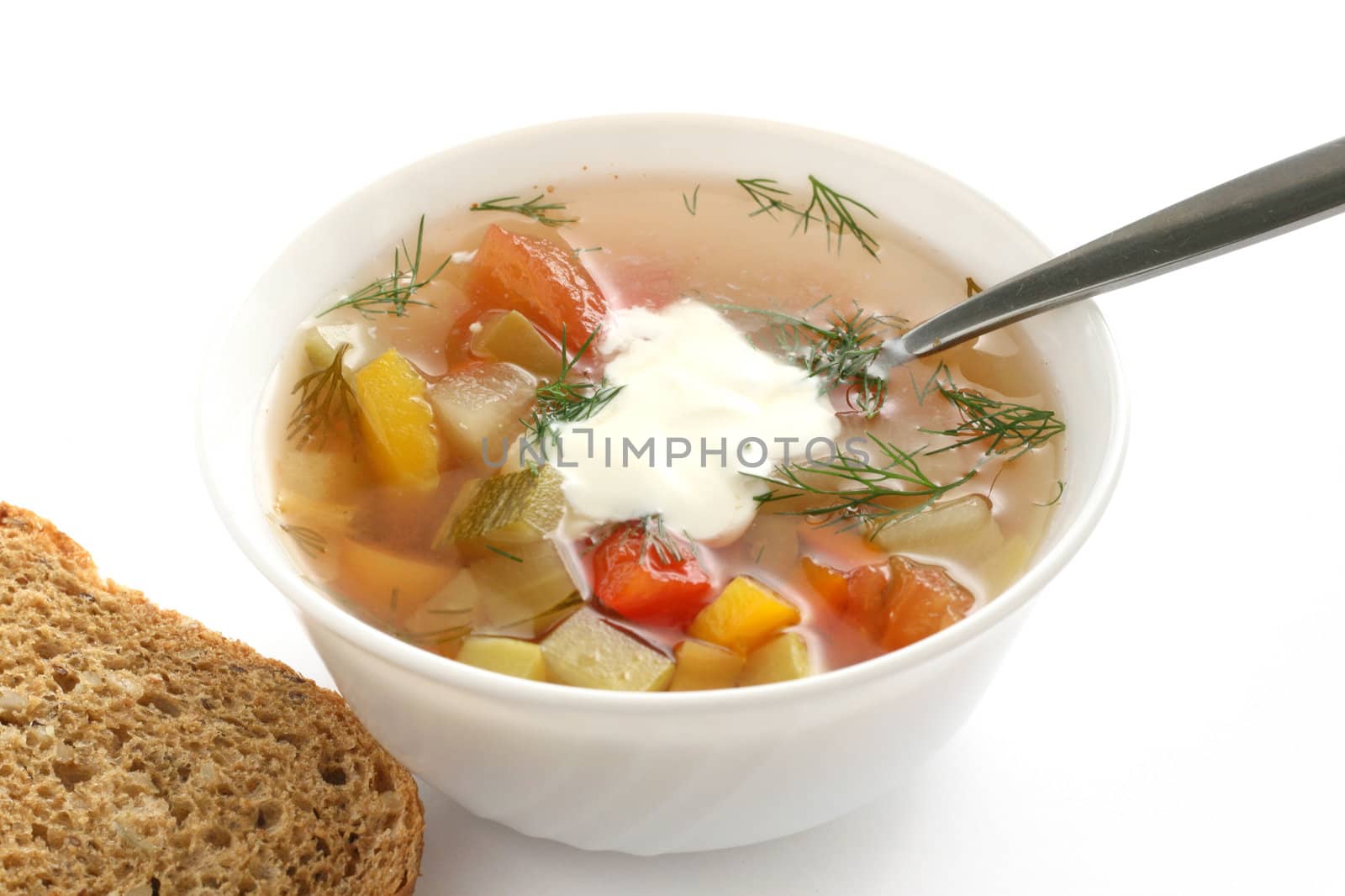 vegetable soup in an white bowl by nataliamylova