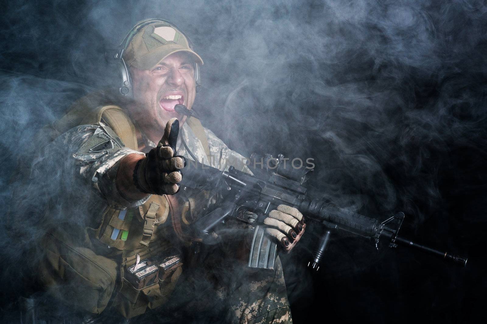 A soldier in the smoke after the explosion by shivanetua