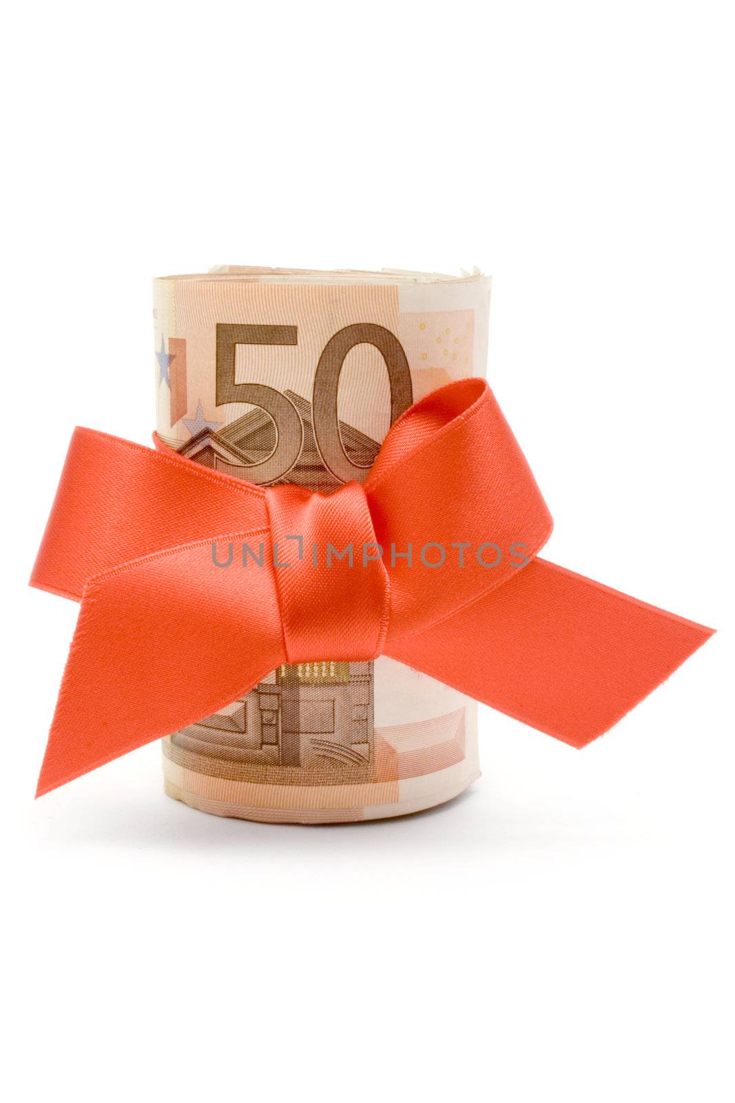 Bundle of 50 Euro banknotes with a red ribbon isolated on a white background.