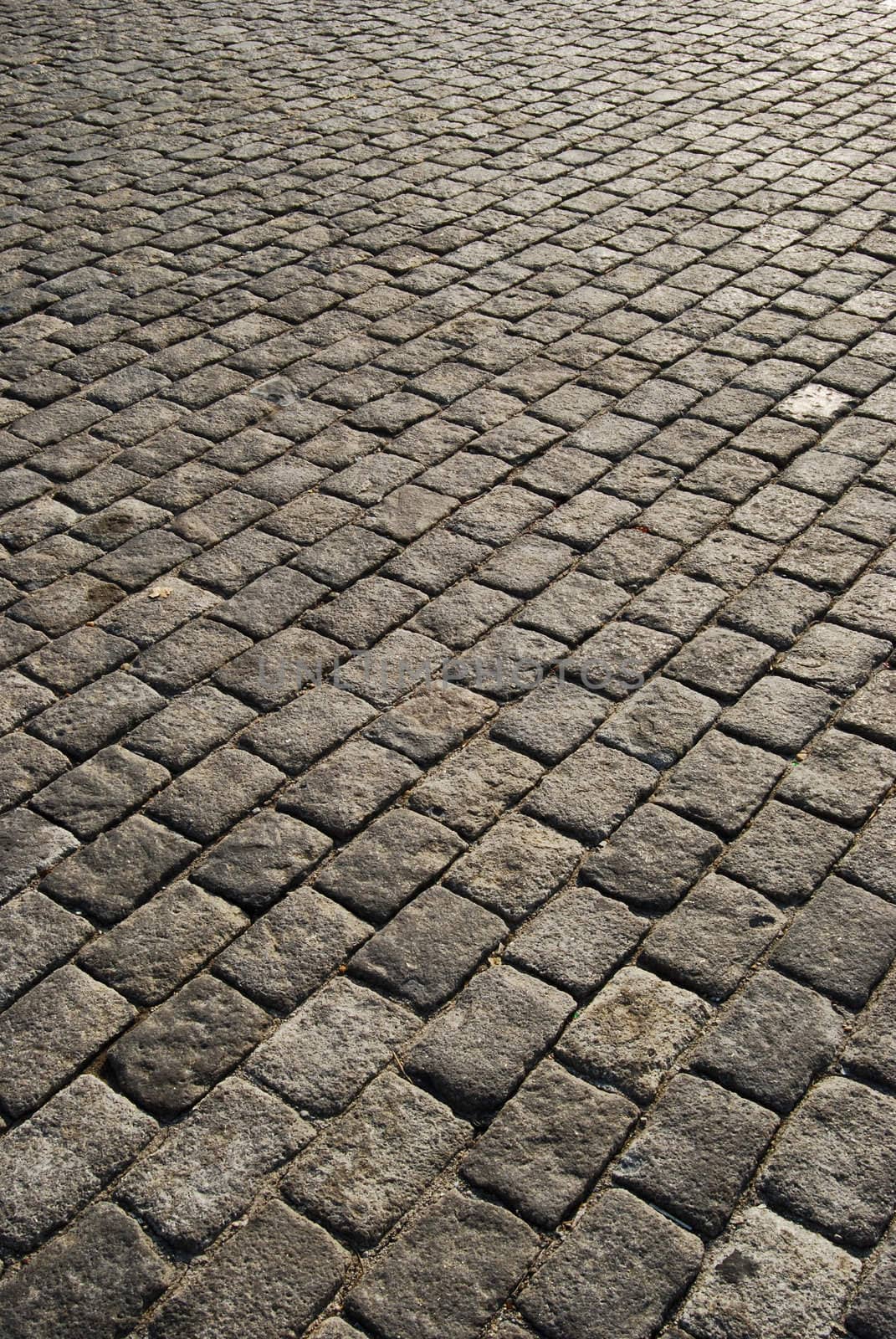 Granite grey town pavement close-up