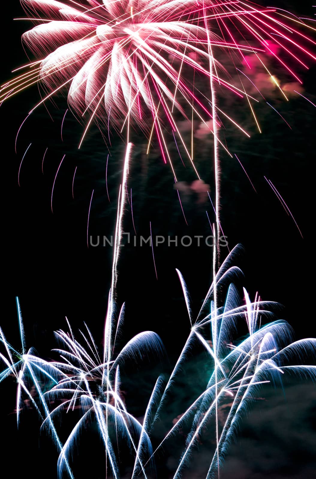 A fireshow taken at night on a festive event.