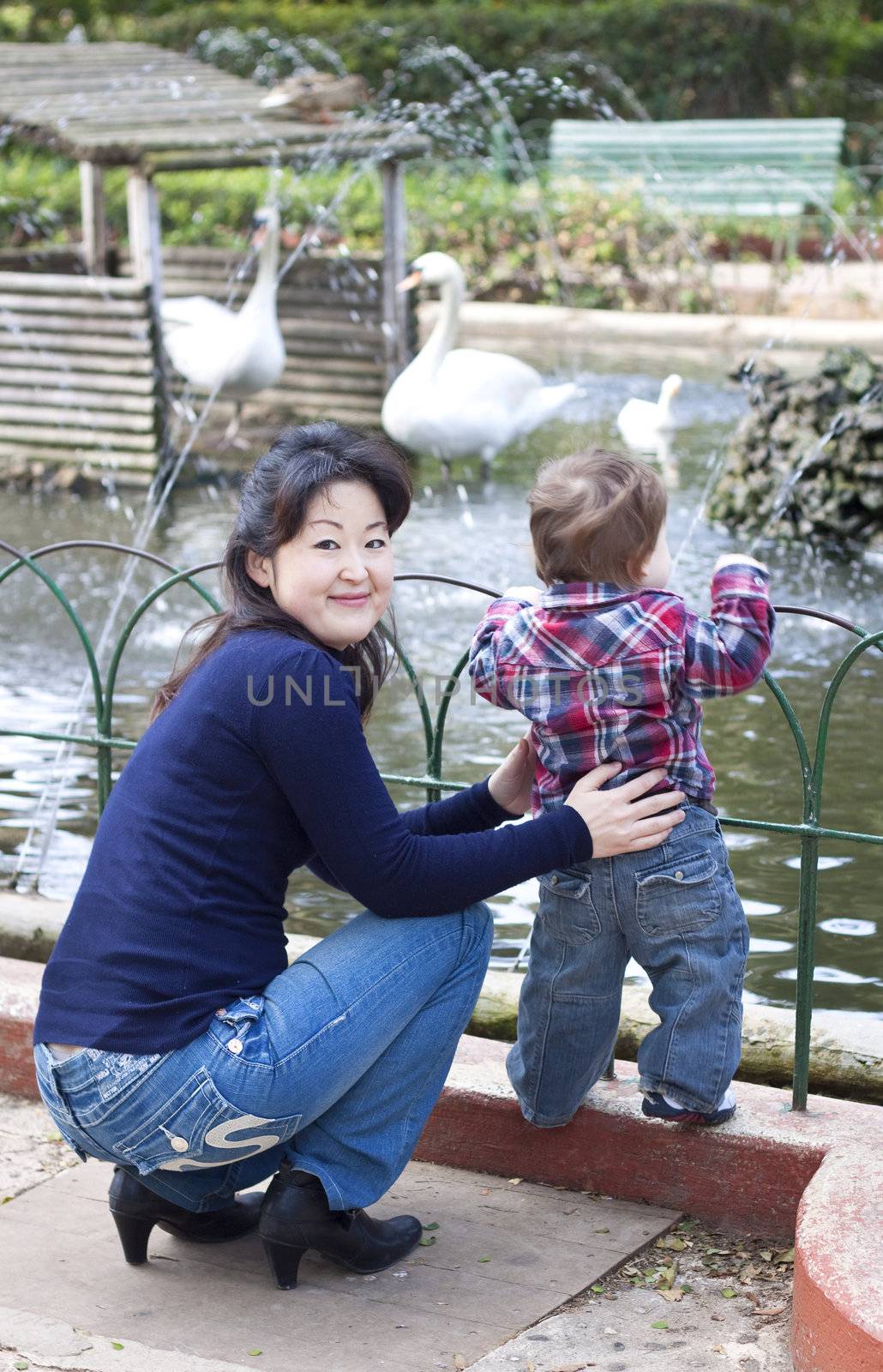 A mixed race family with a japanese mother and baby boy. Real life