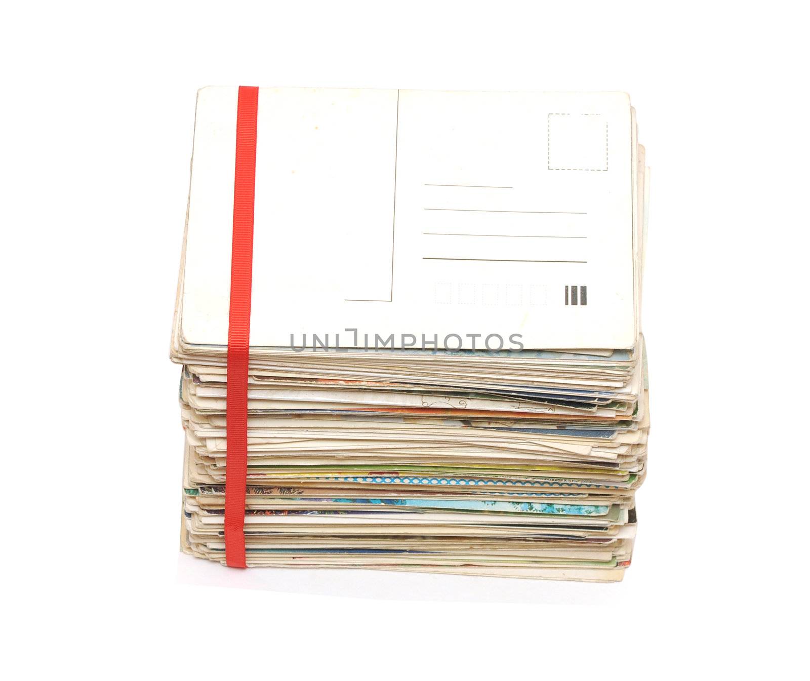 Big pile of old letters and postcards with blank postcard for your text