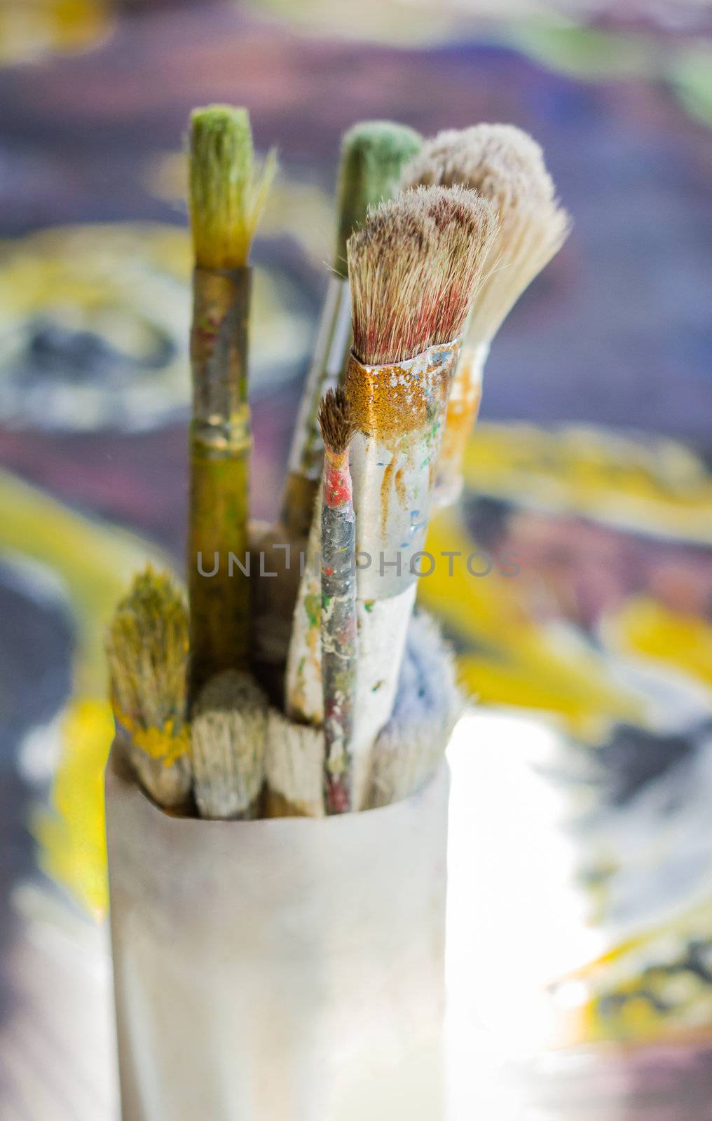 Set of paint brushes on oil painting by doble.d