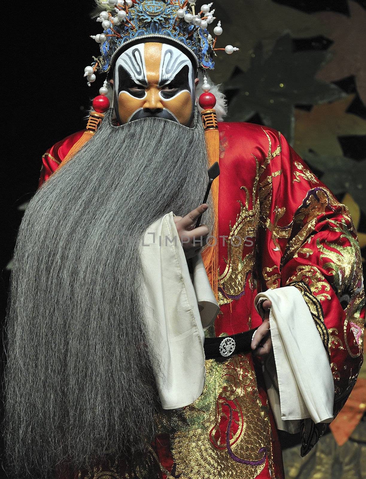 chinese opera actor perform on stage.