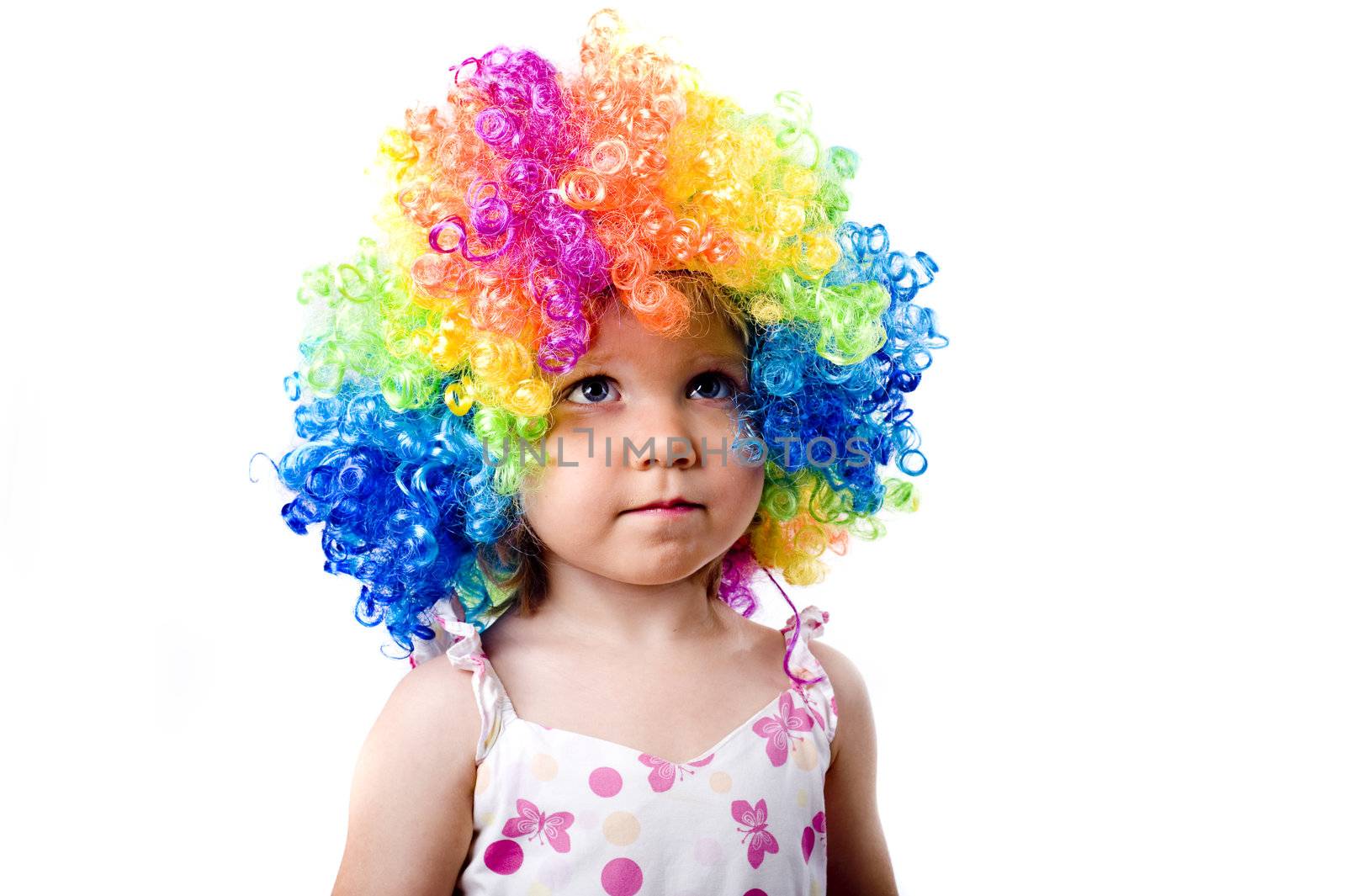 Little gir is heaving colourfull hair, child portrait