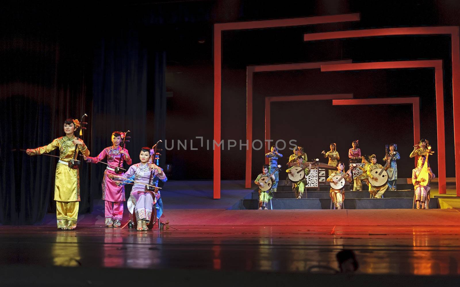 CHENGDU - JUN 17: chinese traditional folk instrumental concert performance on stage at shengge theater.Jun 17, 2011 in Chengdu, China.