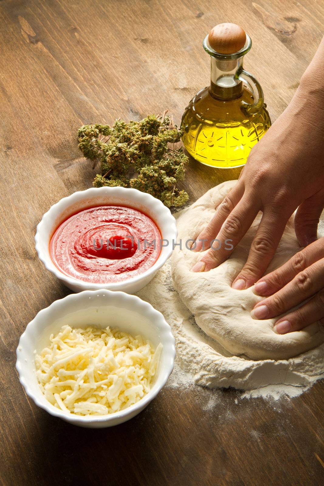 Preparing pizza dough