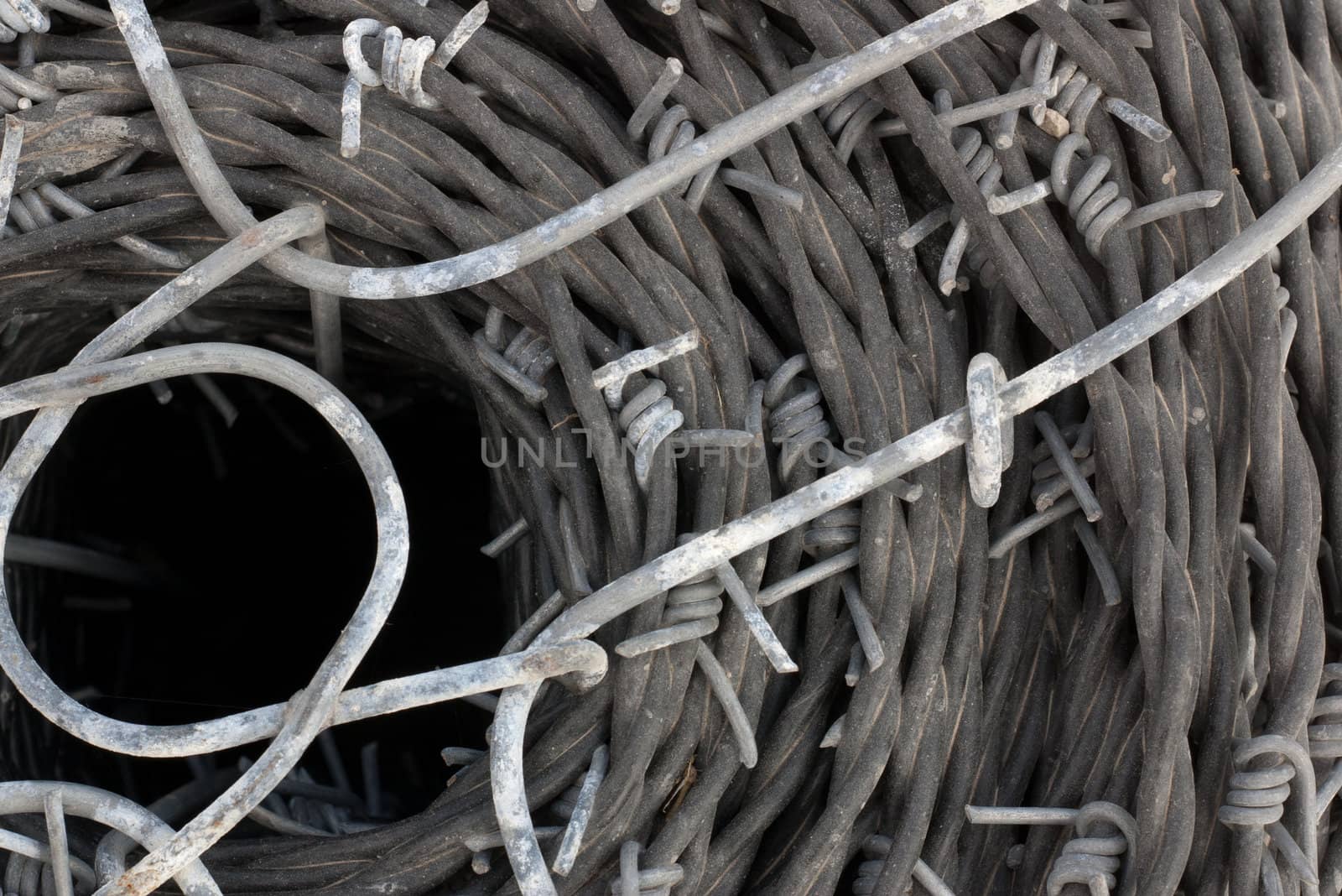 close up of a roll of barb wire background