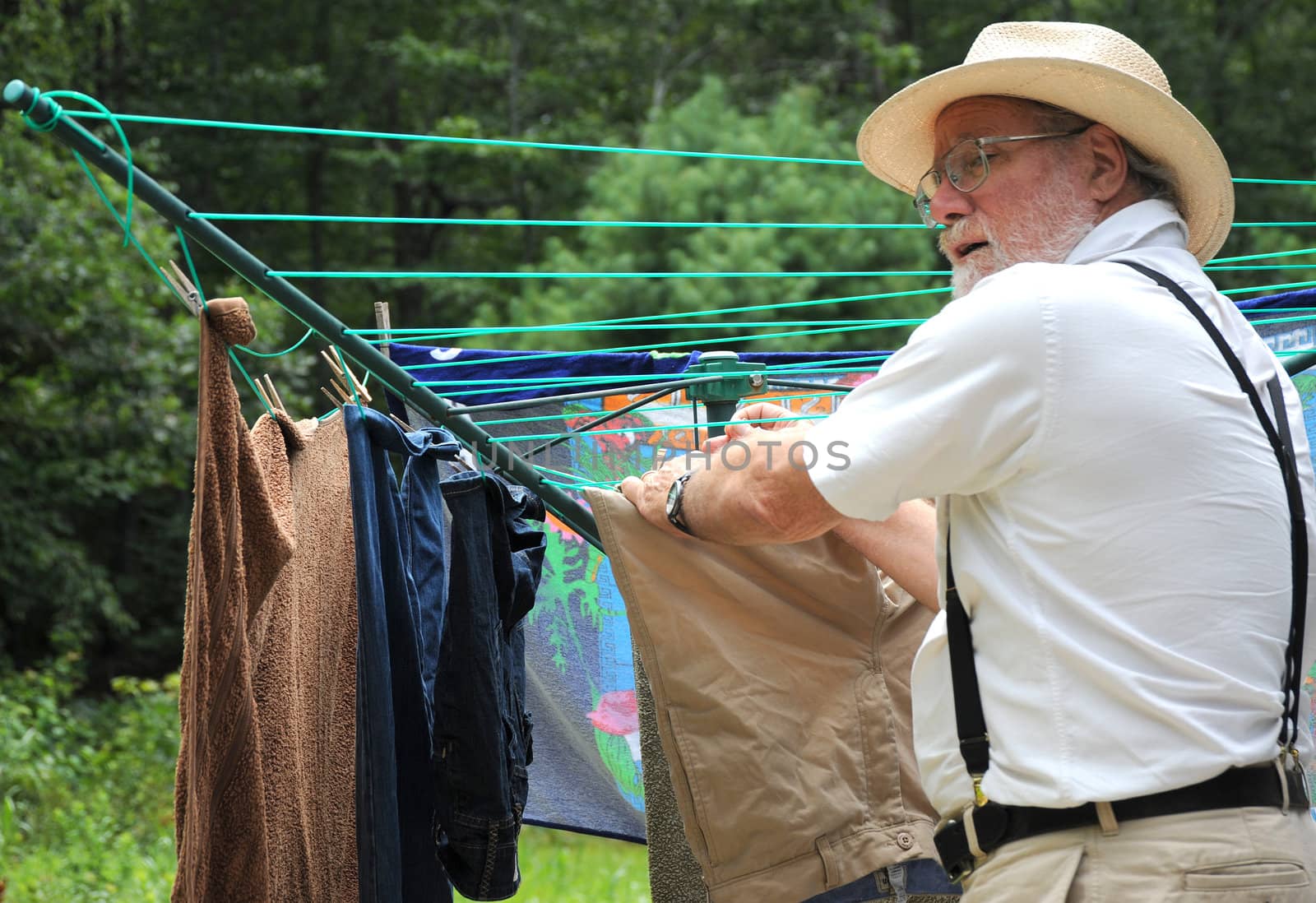 Country gentleman washing his clothes on wash day.