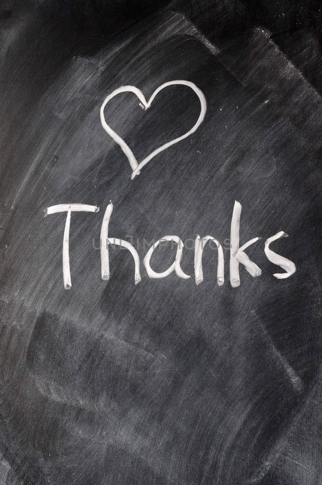 Handwriting of Thank you on a blackboard