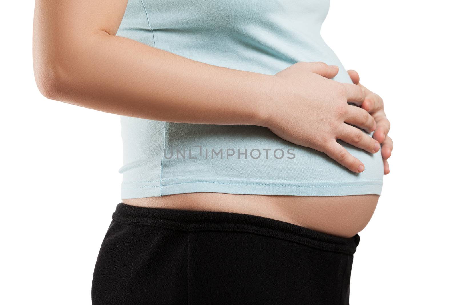 Pregnant woman touching or bonding her abdomen by ia_64