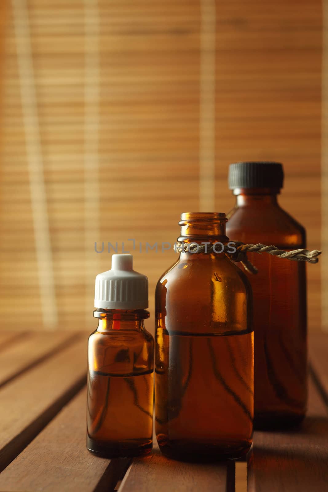 bottles of the massage oil in a row