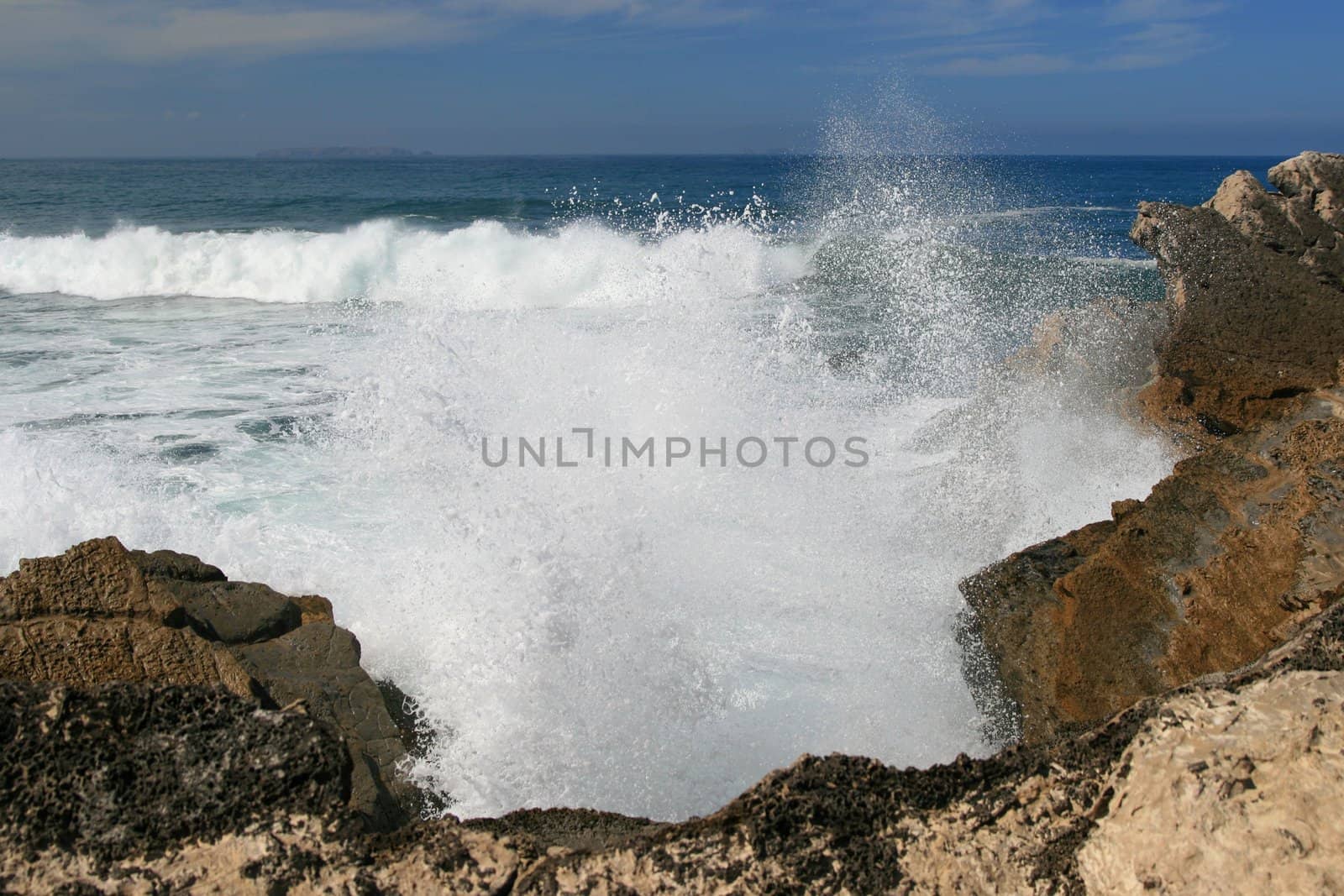 View on rocks and waves of Atlantic ocean