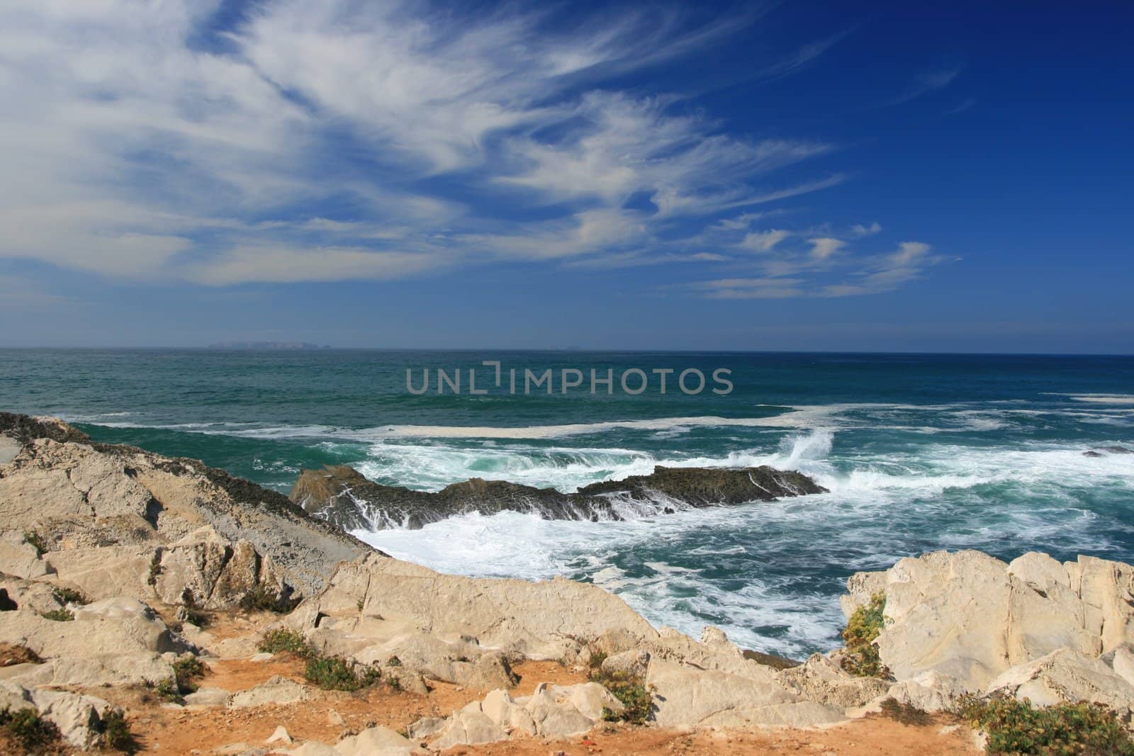 View on rocks and waves of Atlantic ocean by nataliamylova