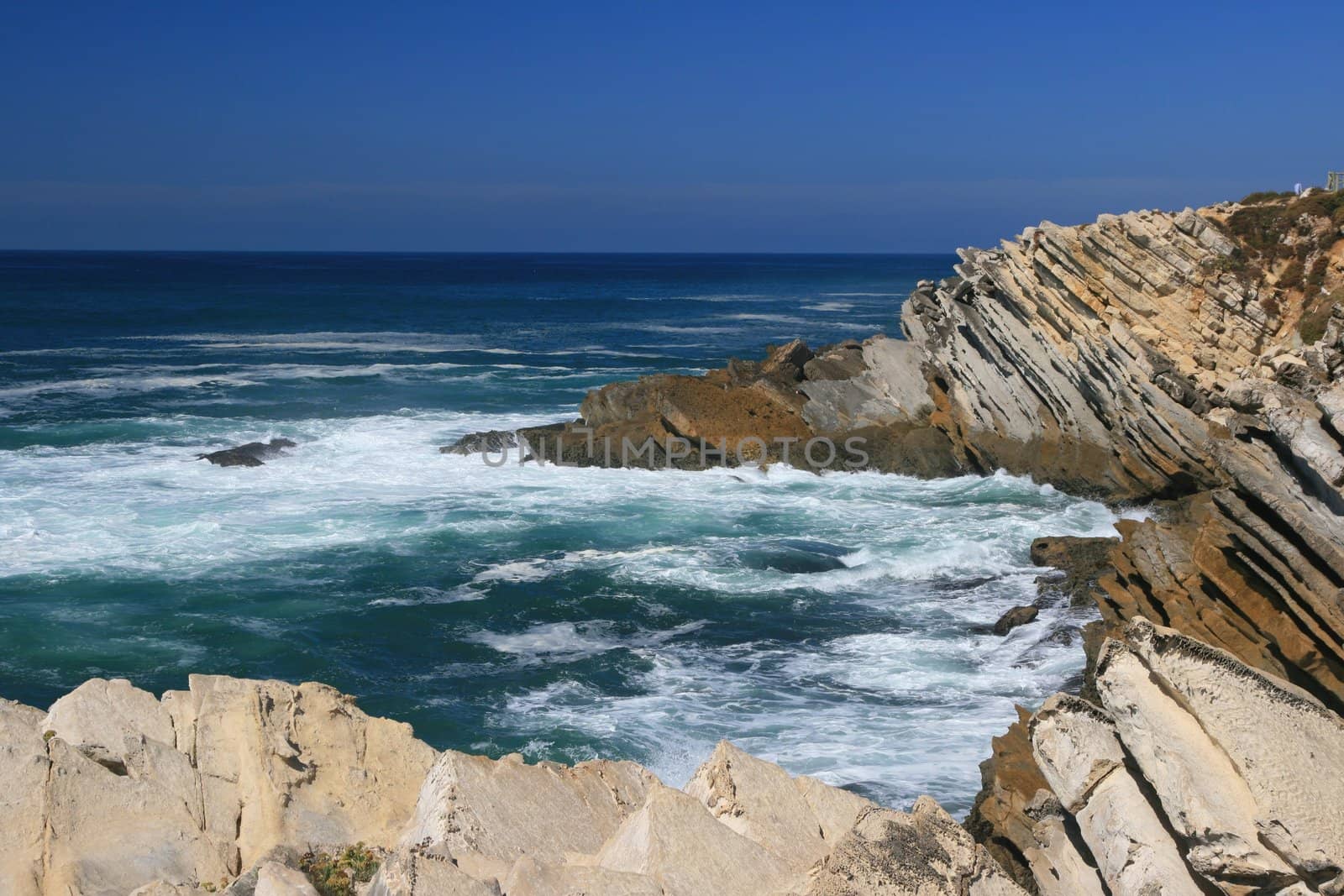 View on rocks and waves of Atlantic ocean