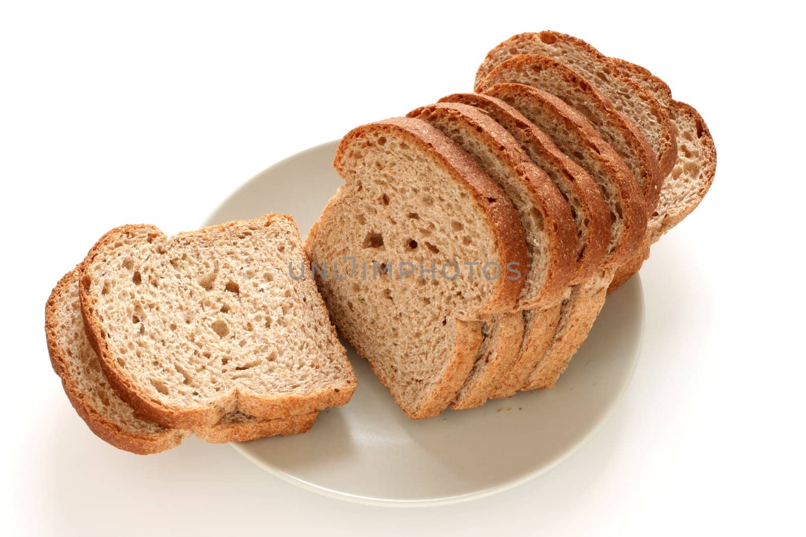 Cereal bread on a plate by nataliamylova