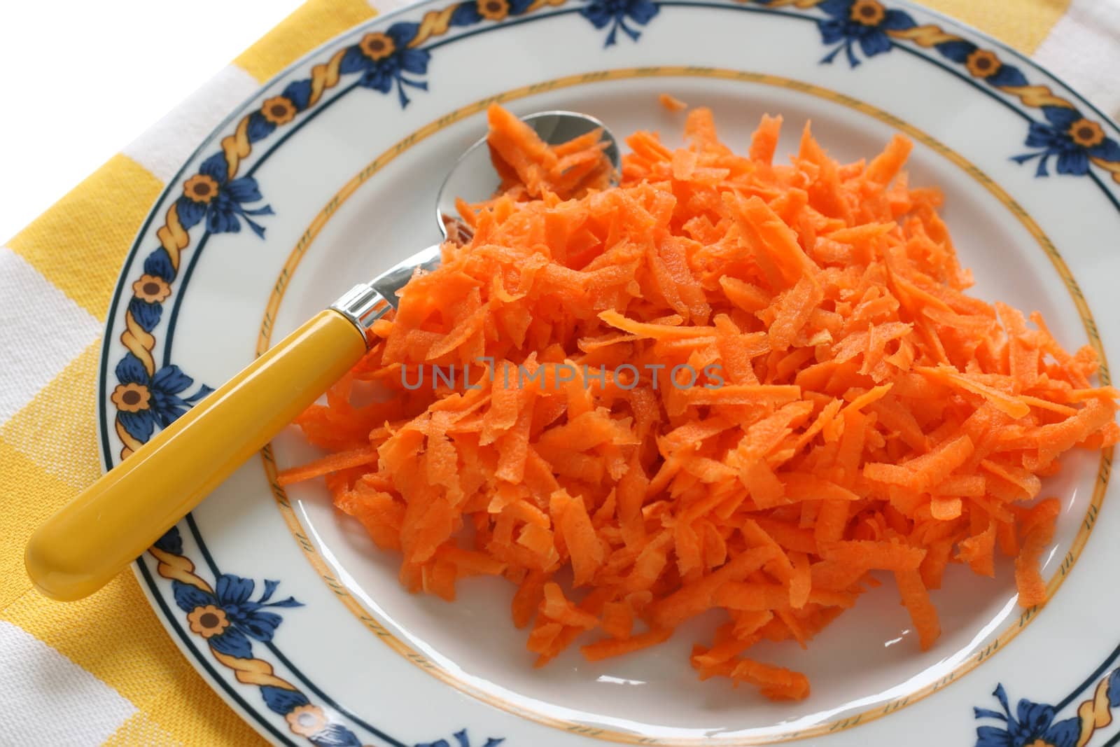 carrot salad on plate by nataliamylova