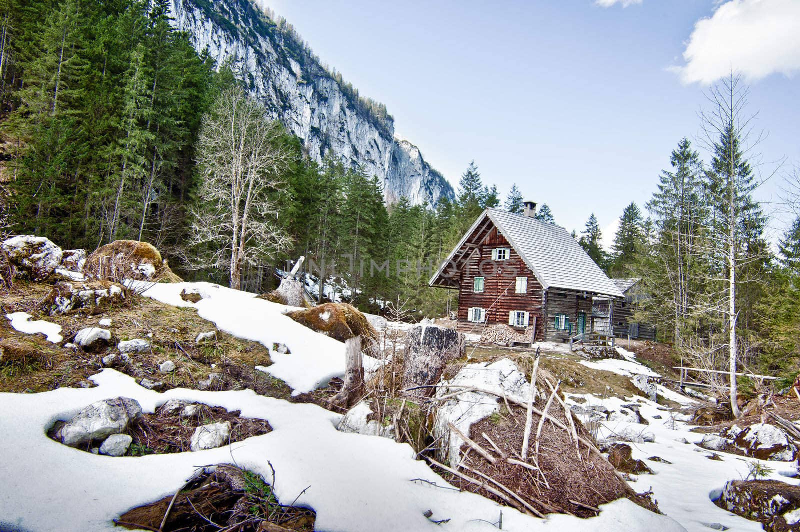 Small hut in winter landscape in the austrian alps