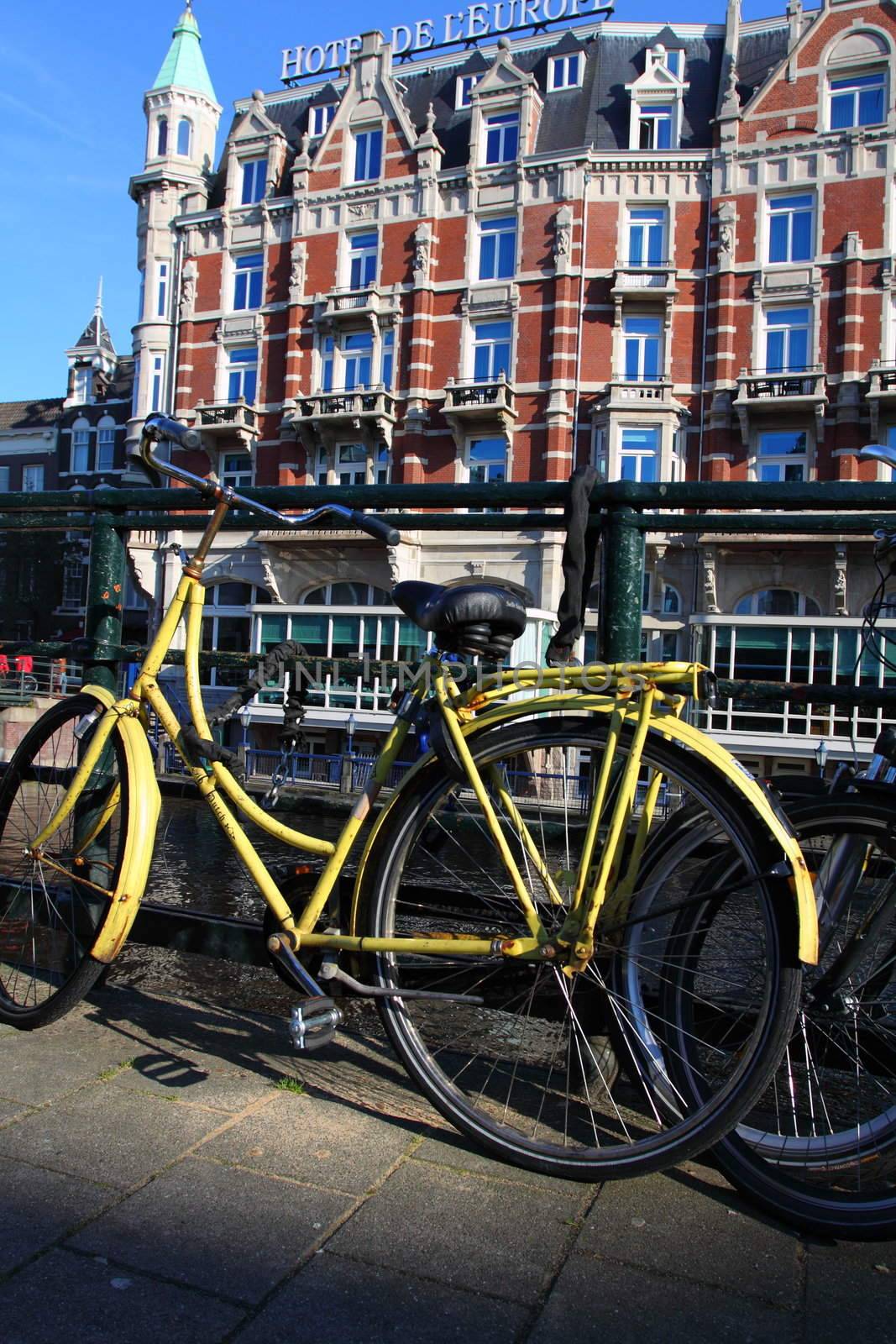 Amsterdam, Canal and bike. Holland.  by mariusz_prusaczyk