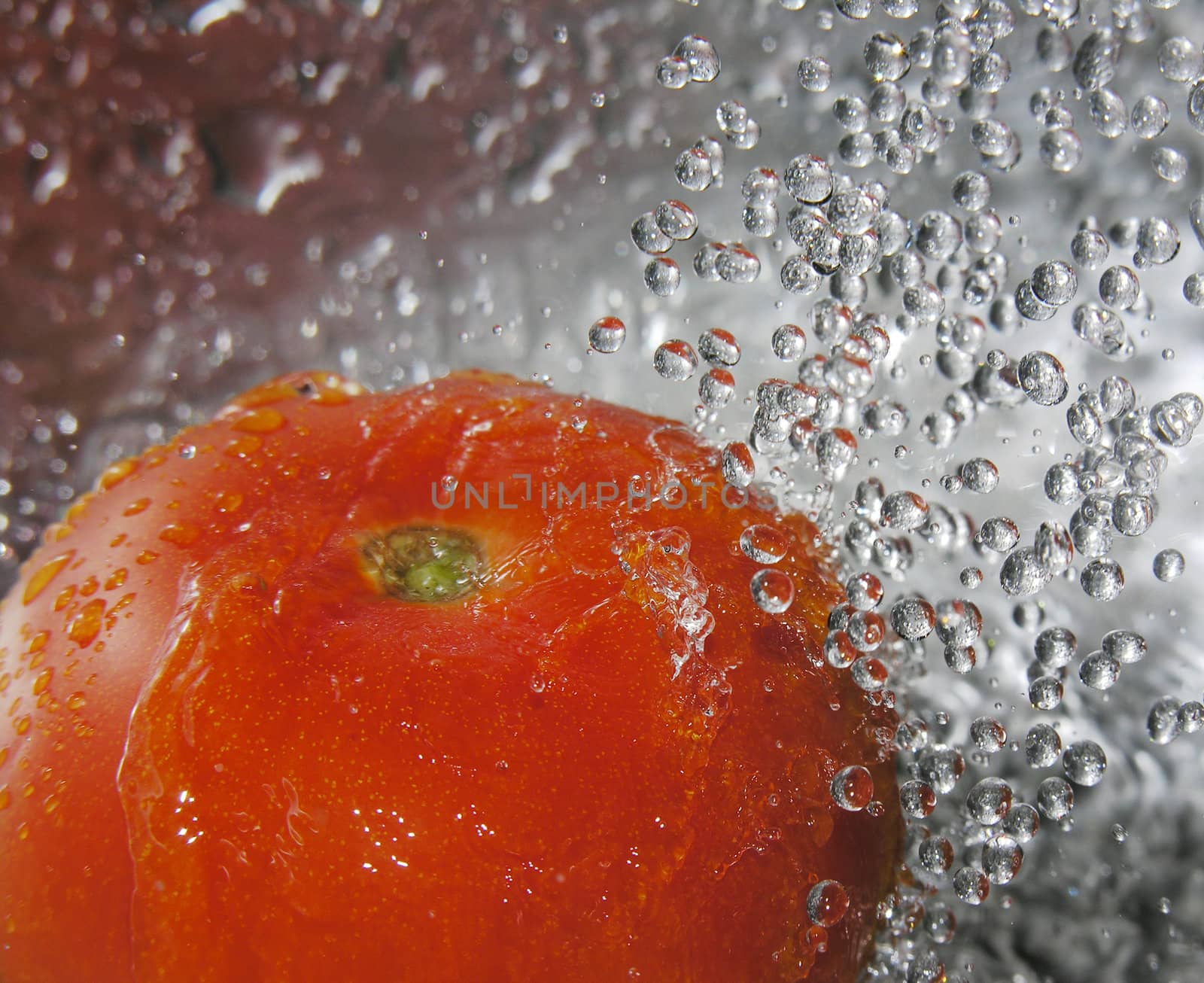 Tomato splashing by kjpargeter