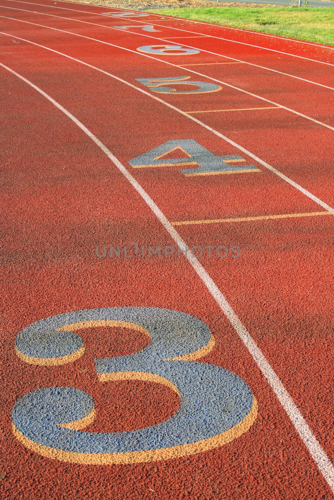 Close up of numbers on running lanes.
