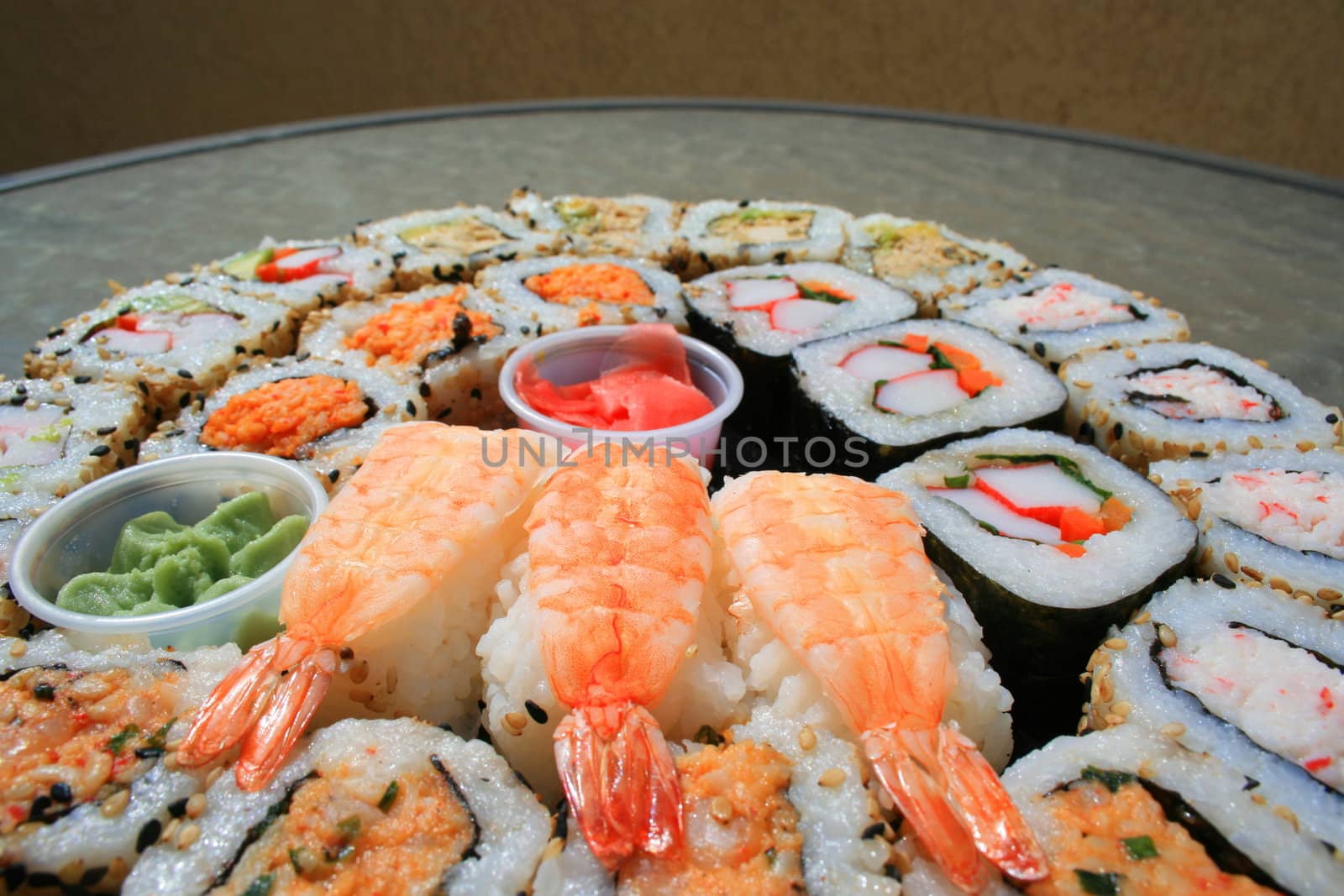 Close up of sushi assortment on a platter.
