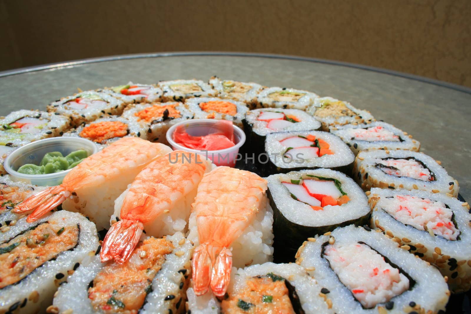 Close up of sushi assortment on a platter.
