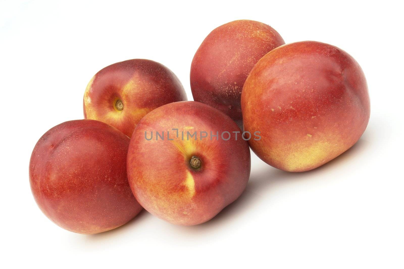 nectarines on the white background 