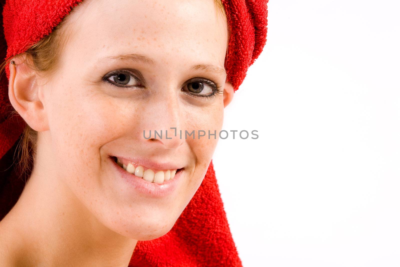 Studio portrait of a beautifull girl smiling at you