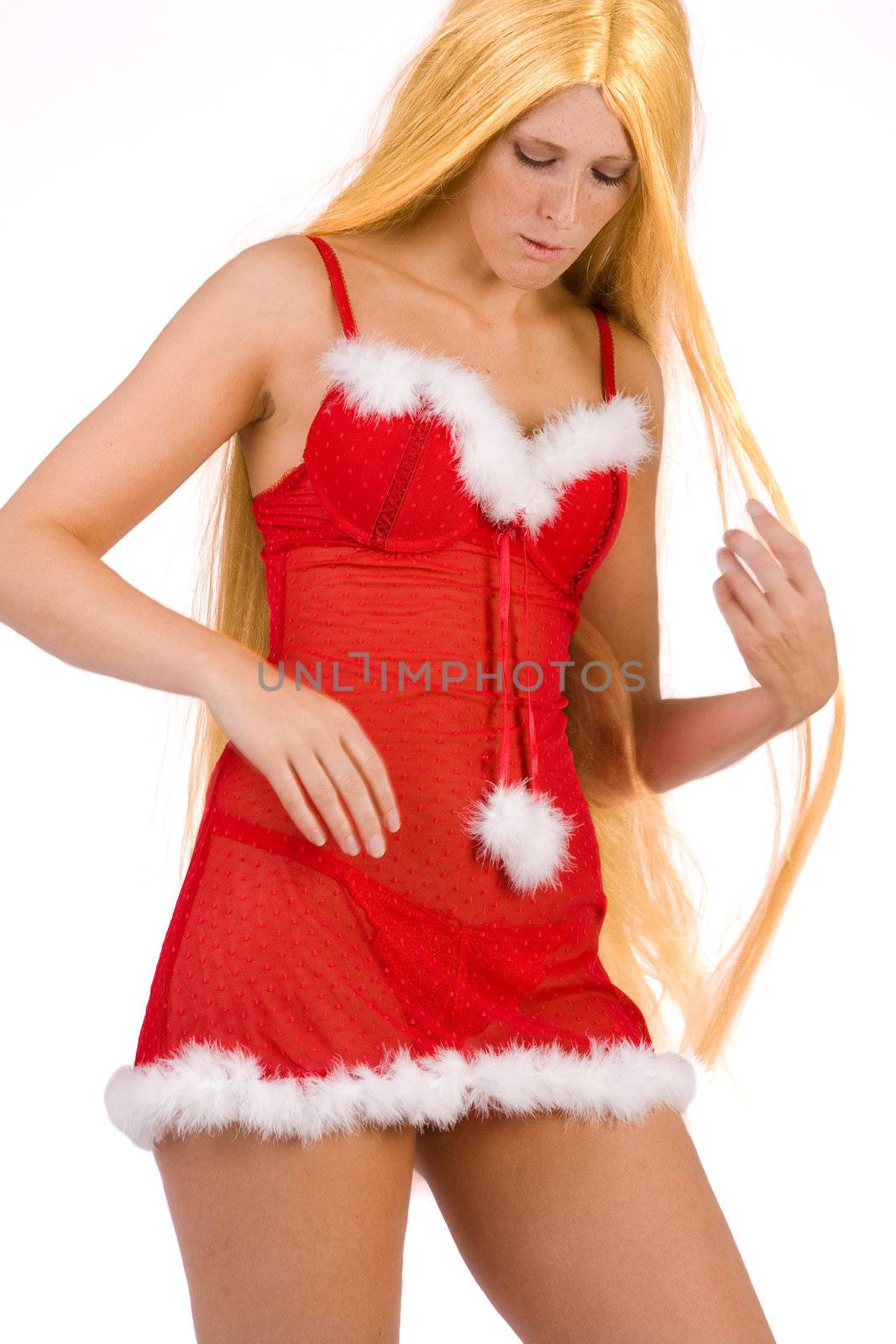 Studio portrait of blond christmas girl with very long blond hair