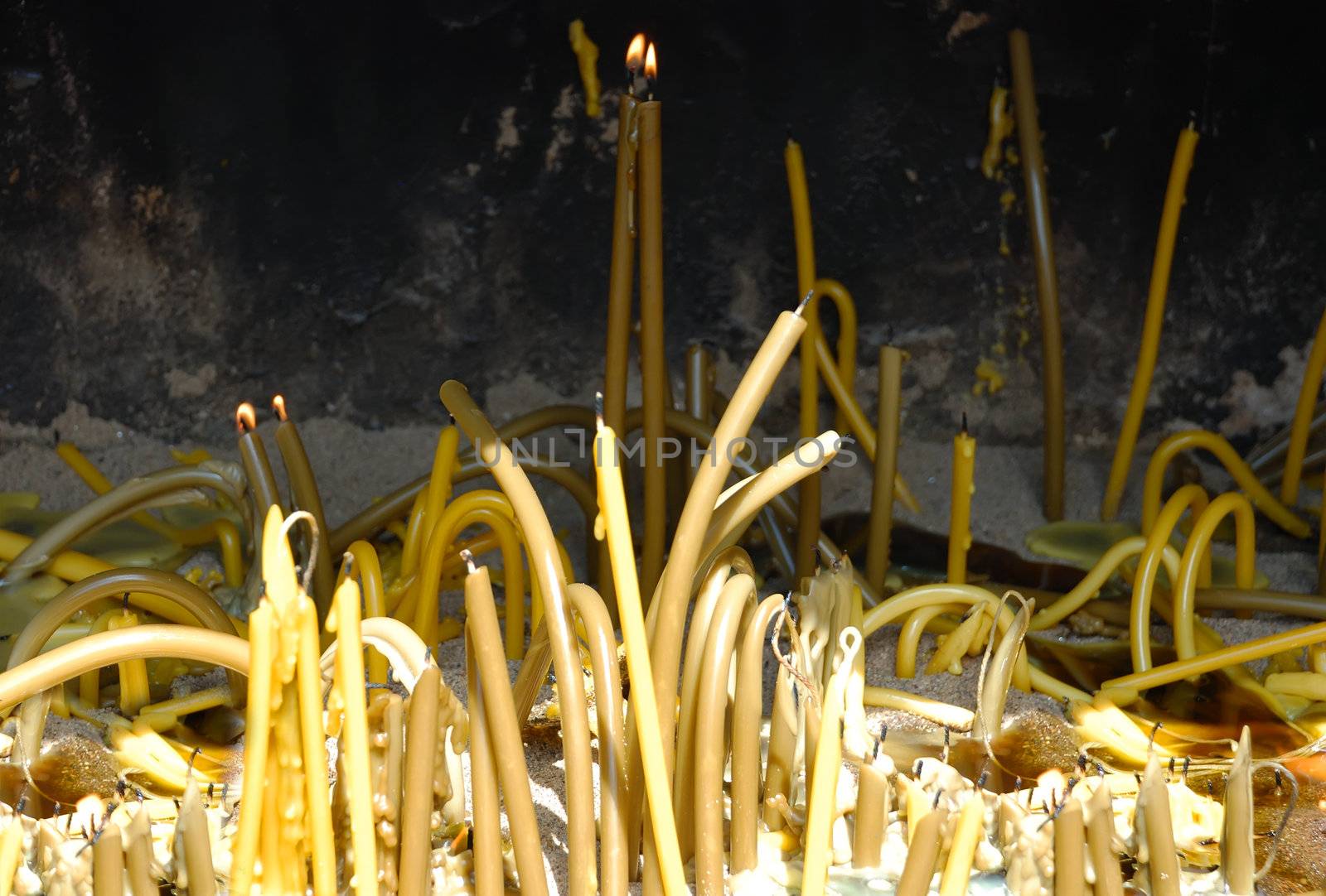 Burned candles by whitechild