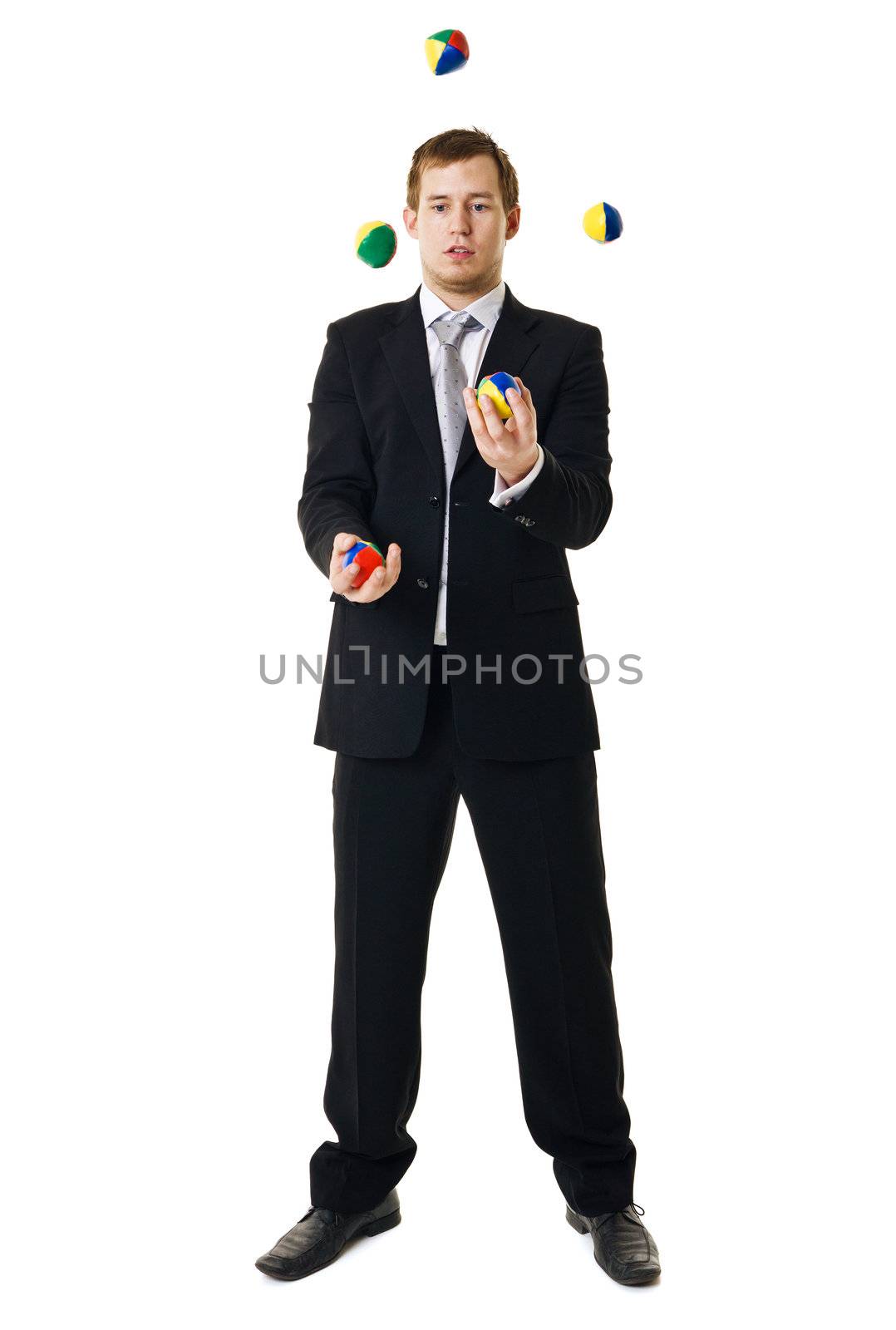 Juggling businessman isolated on white background