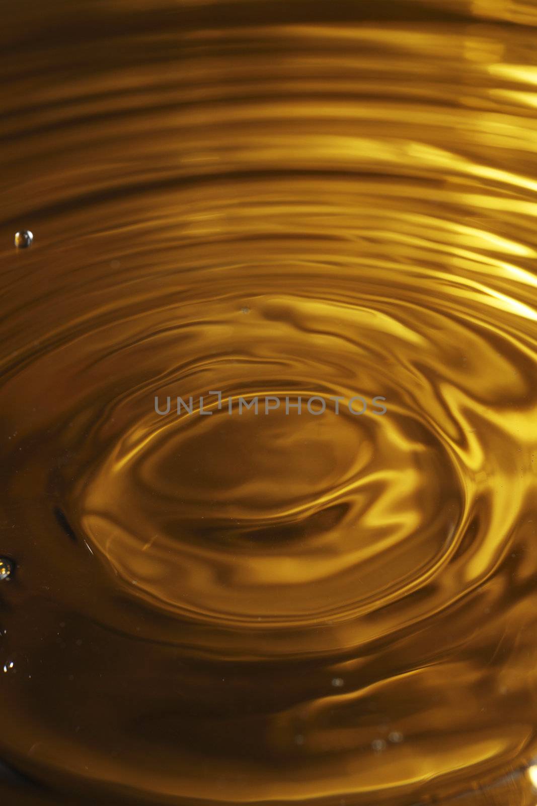 stock  image of the gold color liquid