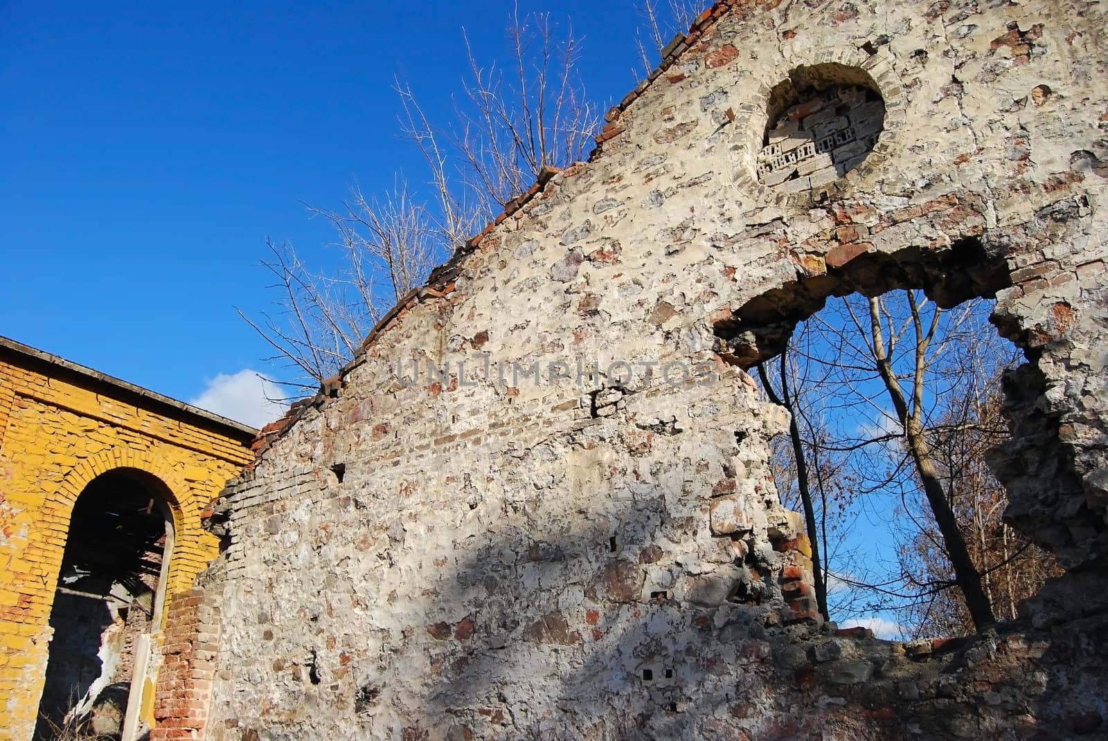 Old ruined factory destroyed  brick walls, demolition