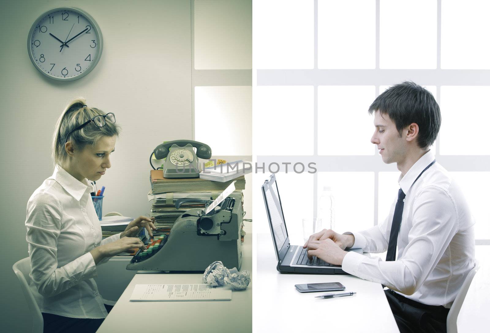 Business woman and business man working in office at desk
