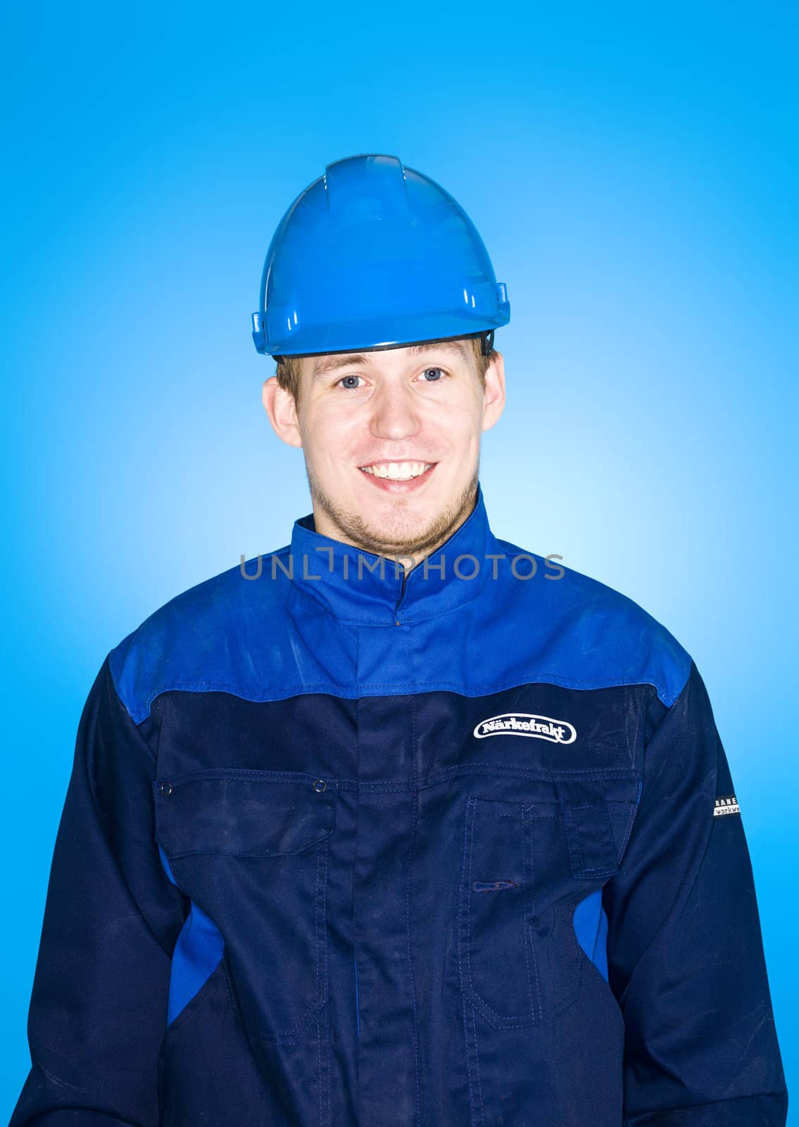 Portrait of a Manual Worker on blue background