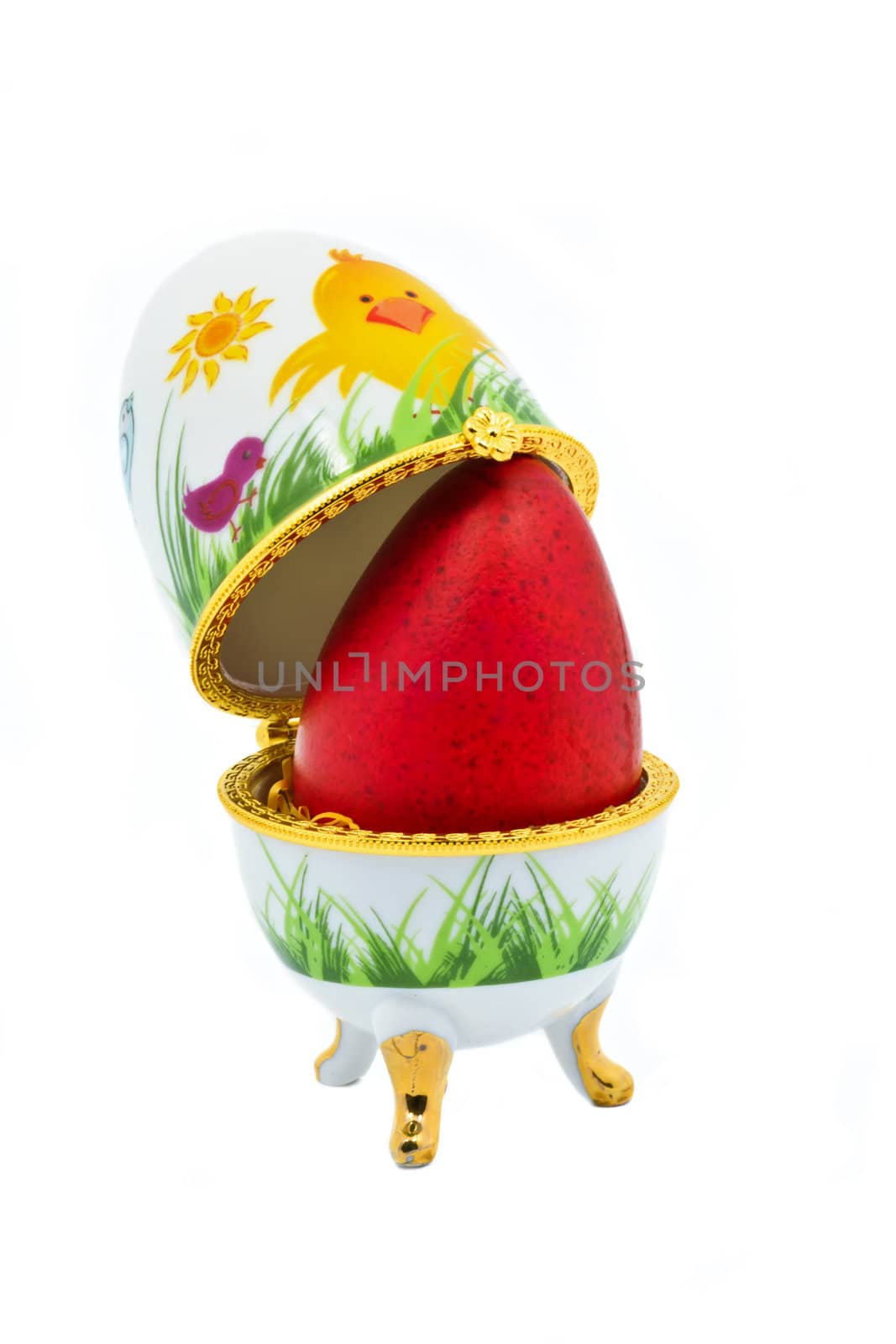 Easter Egg in Decorative Egg Holder isolated on white background