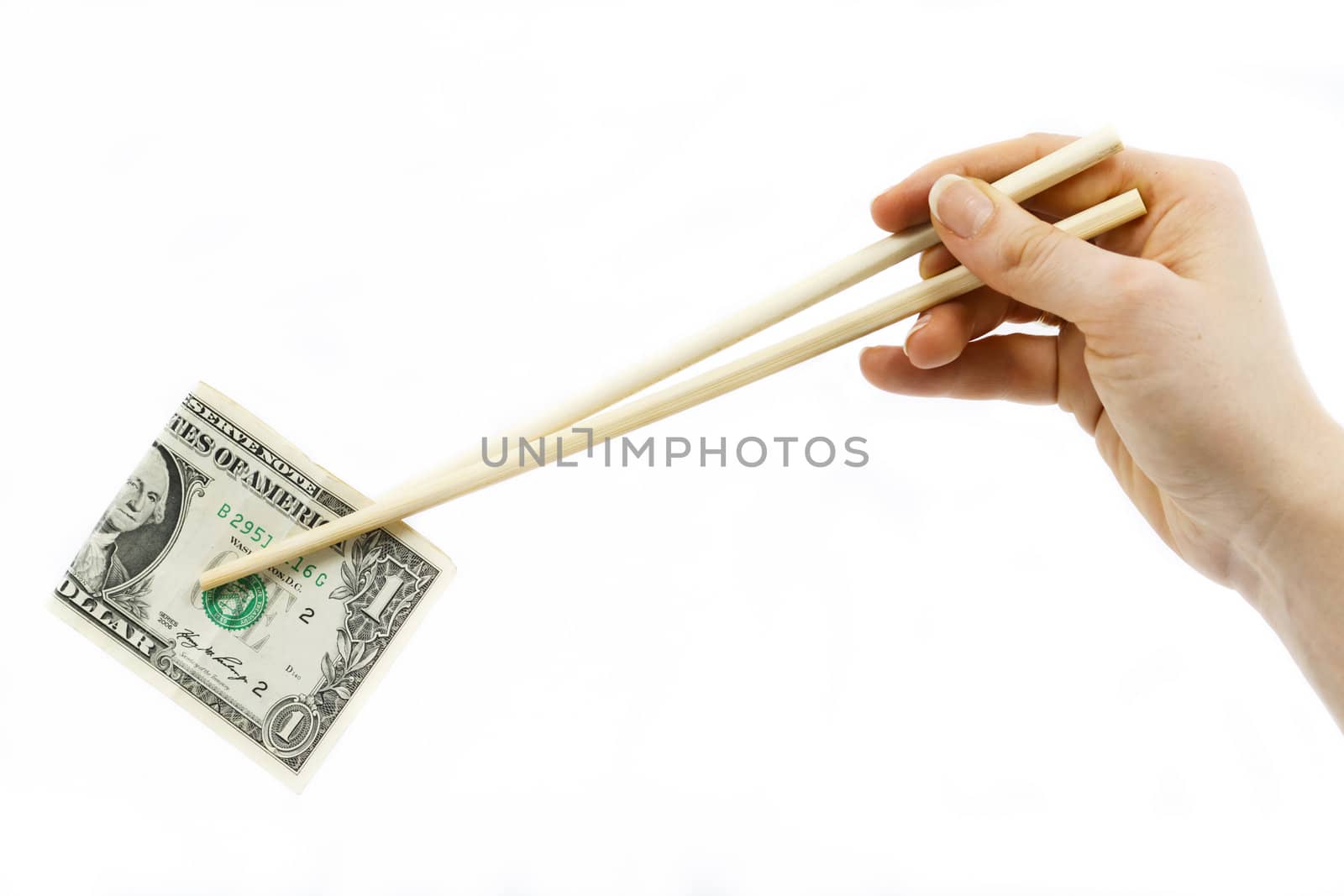 Chinese chopsticks holding American dollar