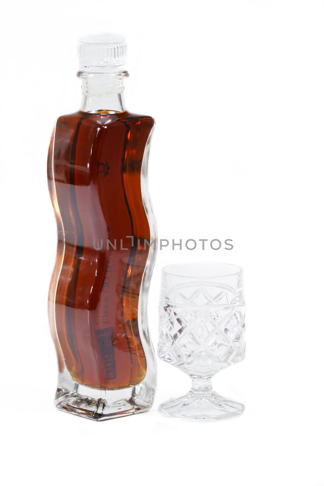 Liquor Bottle with glass isolated on white background