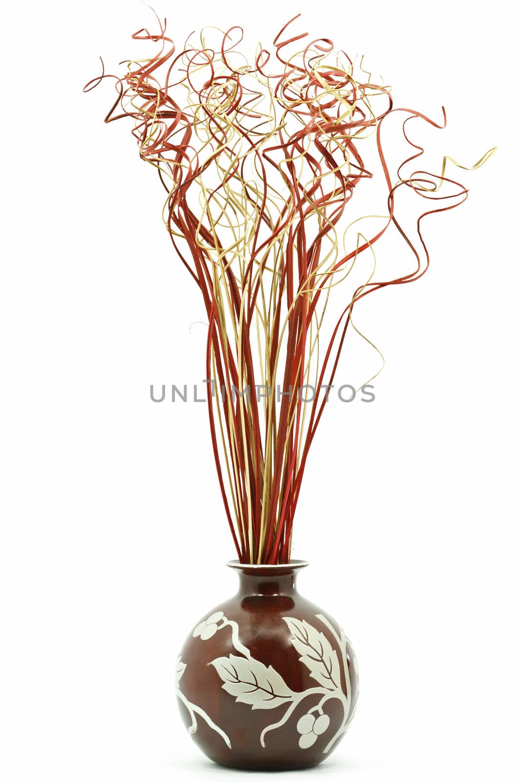 Multicolored bamboo bouquet in vase isolated on white 