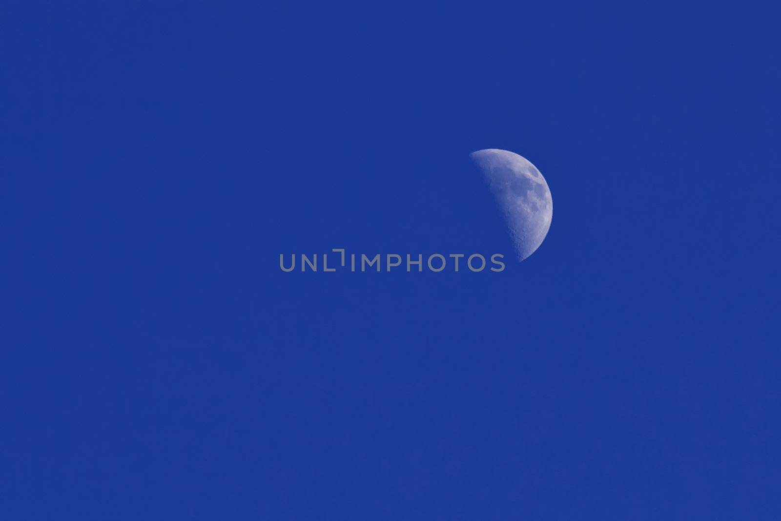 Moon in a clear blue sky