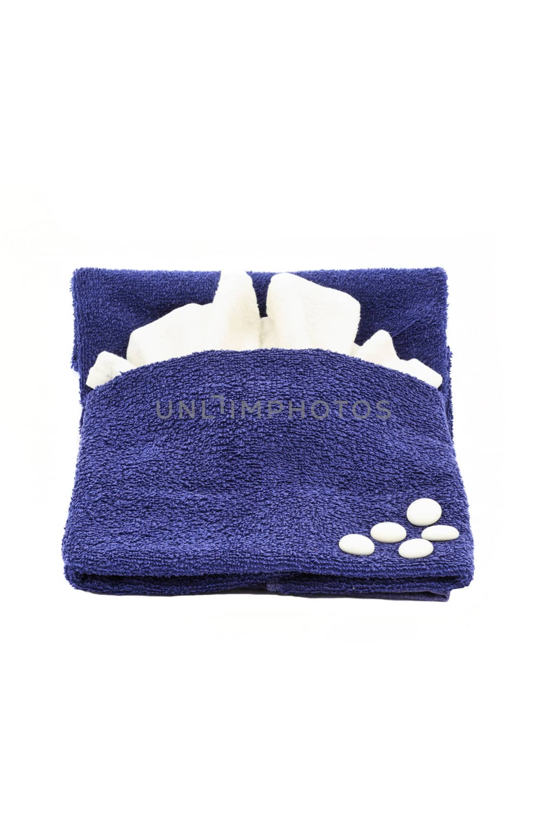 Bed shaped towel decoration isolated on white background