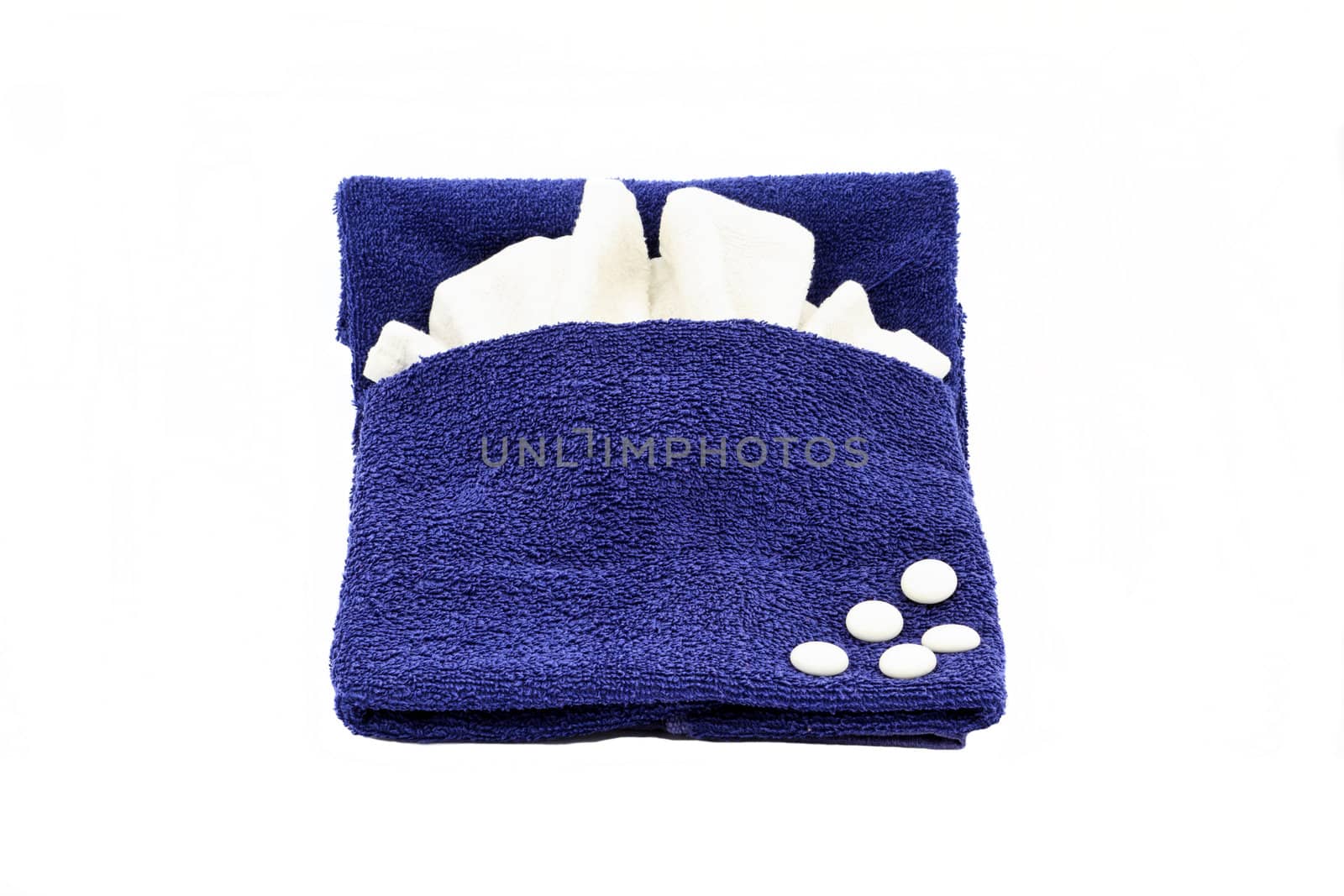 Bed shaped towel decoration isolated on white background