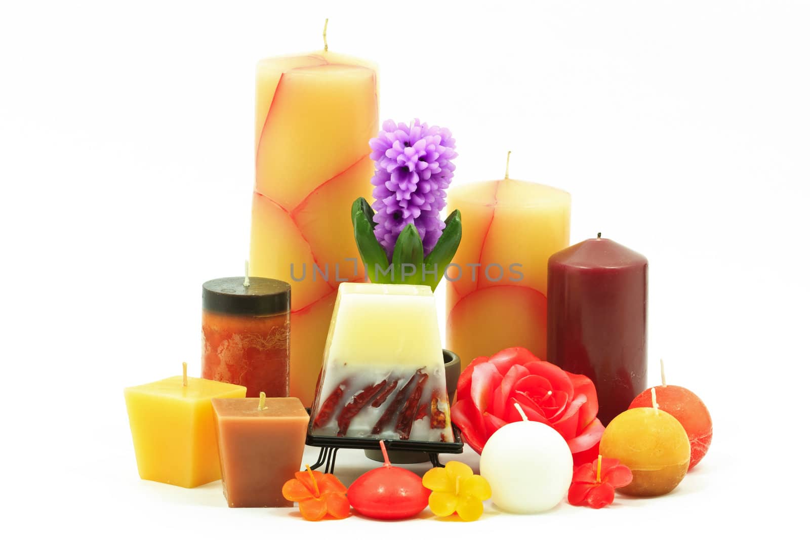 Bunch of different color candles isolated on white background